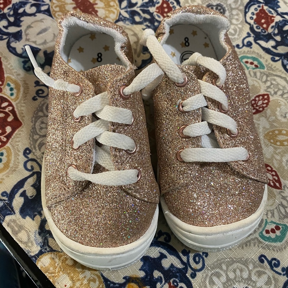 Gold glittery slip ons